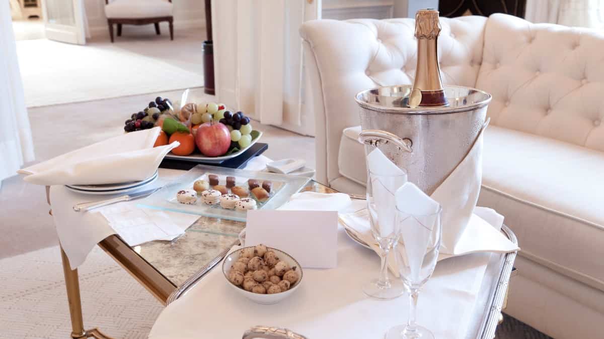 Luxurious suite at The Ritz Paris with champagne and treats