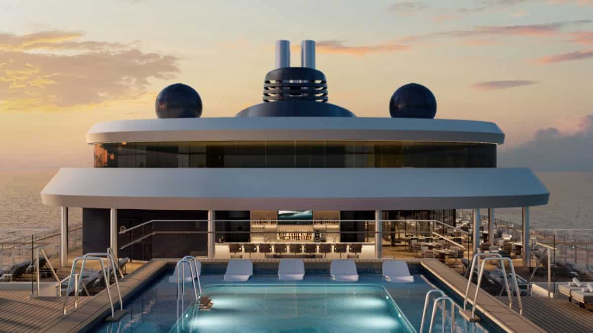 A view of a pool deck and open-air lounge on a Ritz-Carlton luxury superyacht