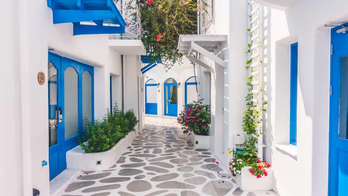 The iconic white walls and blue doors of Santorini buildings